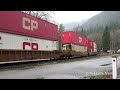Busy Double Stack CN & CPKC Trains Curving Thru Saddle Rock - Fraser Canyon