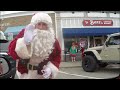 Taking A Candy Cane From A Santa Stranger