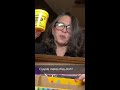 Opening a gift from Crayola