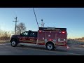 Train almost blocks fire truck