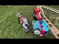 Driving train on backyard railroad to deliver straw and rescue locomotive. Educational | Kid Crew