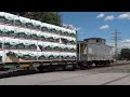 CSX Mixed Freight Train With A Caboose in the Rear