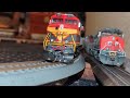 Running ho scale SP and CPKC locomotives next to each other.