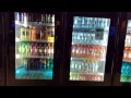 Soda vending machine with a display in its glass