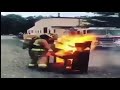 Firefighter playing still d.r.e on a burning piano | man playing still d.r.e on a piano