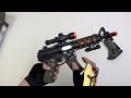 Toy gun unboxing review, M416 electric sound and light test, electric submachine gun