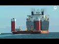 The World's LARGEST Heavy Lift Ship: Moving a Massive Ship with a Giant Semi-Submersible Ship