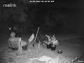 Unexplained flickering lights in the wooded lot.