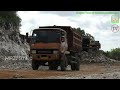 Road Digging Construction - Excavators Dump Trucks Working On The Limestone Hills