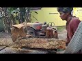 splitting wood, along with a traveling petrol truck