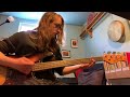 Free styling Smoke on the Water on a bass guitar