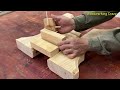 Young Man Skillfully Works With Wood - How To Make Simple Garden Table From Dried Tree Trunks