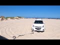 Teamwork makes the dream work: Trucks and Cars Stuck at San Luis Pass