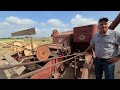 Harvesting milo with an IH Model 80 combine and Farmall 1456 tractor (2023)