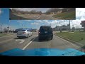 idiot backs up in middle of road & almost hits 2 cars