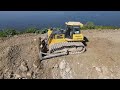 Amazing road building mighty machines bulldozer pushing rock and soil-truck unloading rock and soil