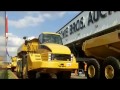 Articulated Dump Trucks Crossing the Auction Ramp