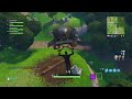 Fortnite Week 10 Treasure | Search Between a Stone Circle, Wooden Bridge, and a Red Rv