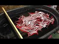 Swirling a B.C. Rich guitar Red, White and Black