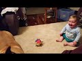 Baby laughing at dog & bubbles