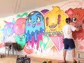 NATE GUILLARD PAINTS MURAL