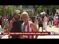 Protesters stand outside federal courthouse in Miami