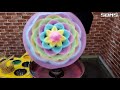 Cotton candy made from colored sugar. amazing process