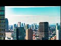 time lapse of the tokyo skyline in the afternoon