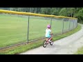 Lily seymour rides bike at park