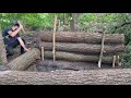 Building of a secret dugout under a fallen tree