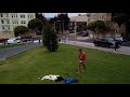 4K Drone - San Francisco Alamo Square with Strange Nudist Dancing