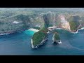 Beautiful green island in the middle of the clear blue ocean.