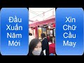 Đầu Năm Xin Chữ Cầu May - At the beginning of the year, please pray for good luck