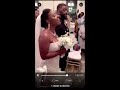 Bride walks down the aisle while singing to groom