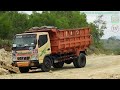 Landscaping Construction  - Excavator Loading Dirt Into Dump Trucks