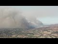 Plane drops retardant on Anaheim Hills fire