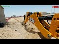 JCB 3DX backhoe loader working excavation for new installation underground electrical cable