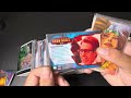 Unboxing mostly serialed marvel cards from different sets.