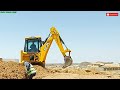 JCB 3DX backhoe machine working excavation for new installation underground electrical cable