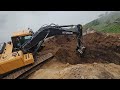 Expert Operator Building Narrow Mountain Road: Hyundai Excavator Expertly Clears Stones and Trees