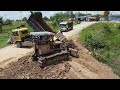 Fantastic New Filling,Dump Truck pouring soil into water Operation by Komatsu Bulldozer Pushing