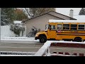 Aisha waiting for the school bus.