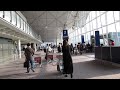 In Hong Kong International Airport - walking to the gate