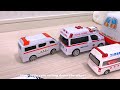 little ambulance cars, driving downhill
