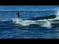 Surfer catchin' a ride on the king tide at Barview Jetty, Oregon 2-10-24