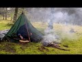 Hard conditions of camping in storms and heavy rains and floods in the forest