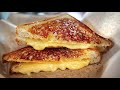 The Secret Ingredient You Should Be Using On Your Grilled Cheese