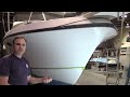 How to repair impact damage in a fiberglass boat hull?