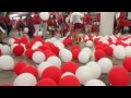 Crowd bursting balloons while leaving NDP 2016