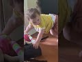 Sweet little princess, playing with a high little chair of her high chair